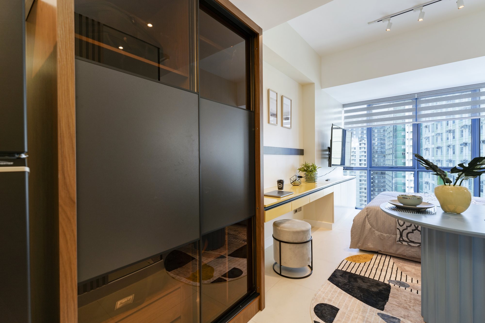 Bedroom with desk and window